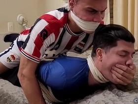 Two football player boyfriends are captured and tied and gagged together undefined Advance showing japan gay porn scat